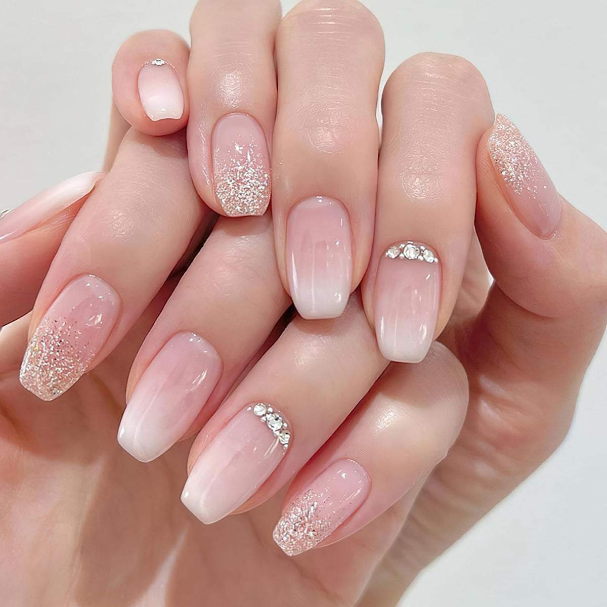 Gradient Pink Press on Nails Short Square Coffin Fake Nails with Rhinestone Glossy Glitter Glue on Nails Nude Pink Full Cover Stick on Nails Design Artificial Acrylic False Nails for Women Girls 24pcs